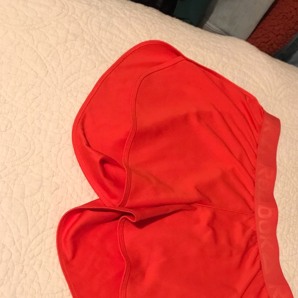 Red Reebok shorts